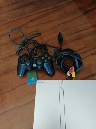 PS2 Slim Silver + cavi + memory + pad (un tasto)
