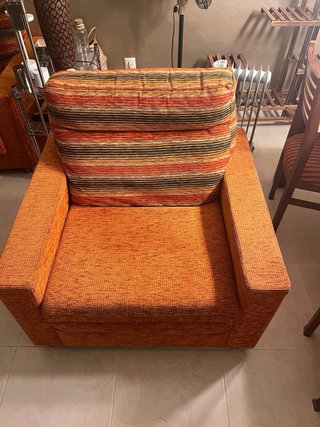 Sillón cama naranja y multicolor