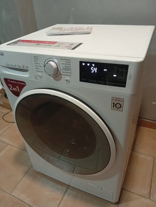 Lavadora Secadora LG Direct Drive 8/5kg seminueva
