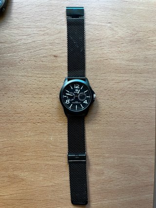 Reloj Marea Negro y Plateado