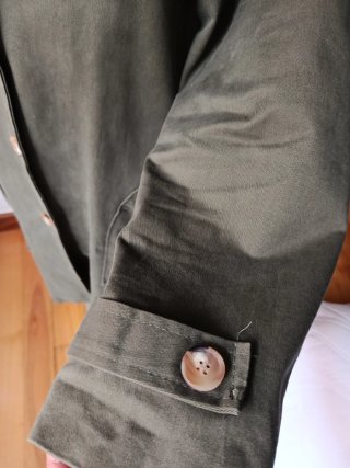 Gabardina de tela verde