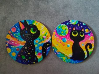 Sottobicchieri in legno con stampe di Gatti