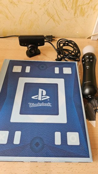 Ps3 slim + Accessori + Giochi + Wonderbook