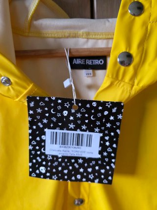 Chubasquero con etiqueta Aire Retro Amarillo