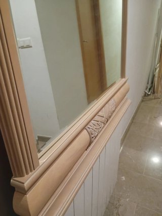 Espejo grande de madera y cristal