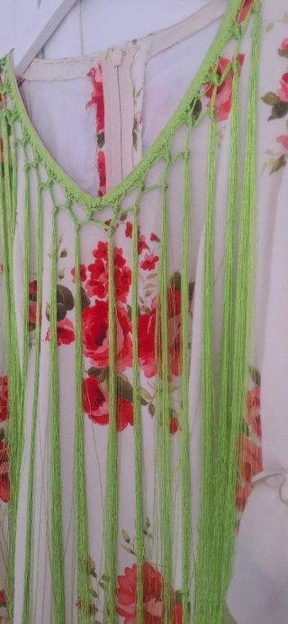 Traje de flamenca con flecos