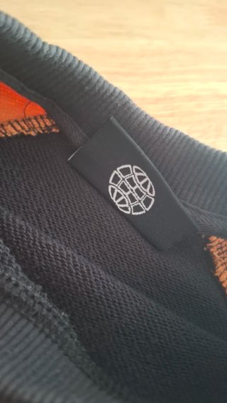 Sudadera Cold Culture Negra y Naranja