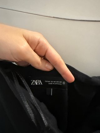 Tuta elegante nera con fiocchi