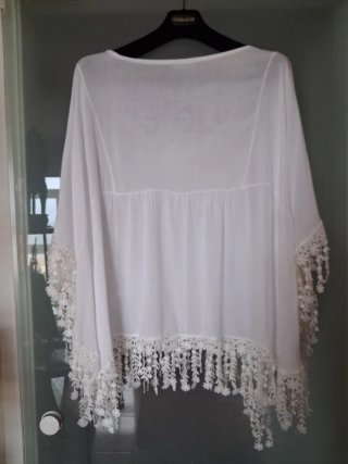 Túnica playera blanca con encaje
