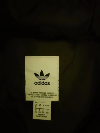 Piumino Adidas nero con cappuccio