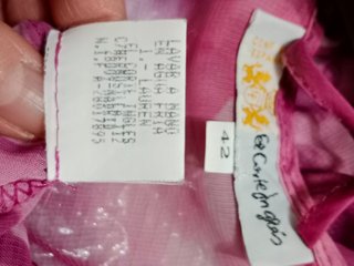 Blusa rosa y morada con volantes