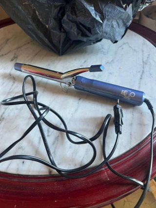 Rizador de pelo EGO azul y plateado