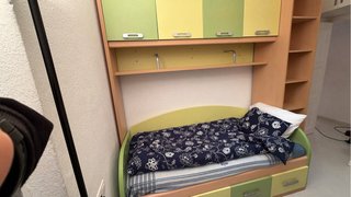 Dormitorio juvenil con cama y almacenaje