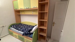 Dormitorio juvenil con cama y almacenaje