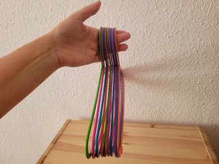 Lote 10 perchas infantiles plástico finas