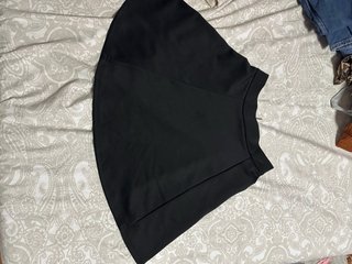Minifalda negra tablas/volantes