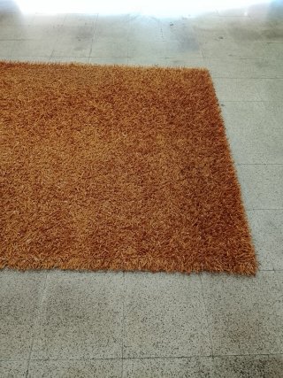 Alfombra de tela y yute