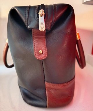 Bolso de mano piel azul y marrón