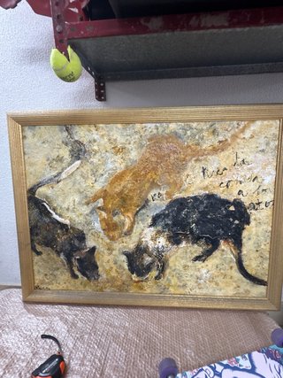 Cuadro de gatos en piedra