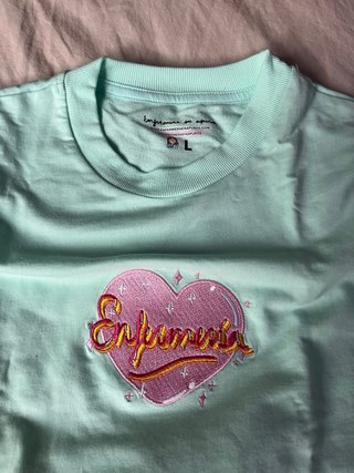 Sudadera verde agua con corazón enfermera