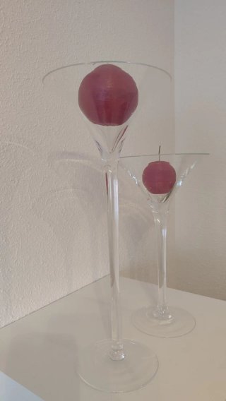 2 Jarrones de cristal con velas rojas