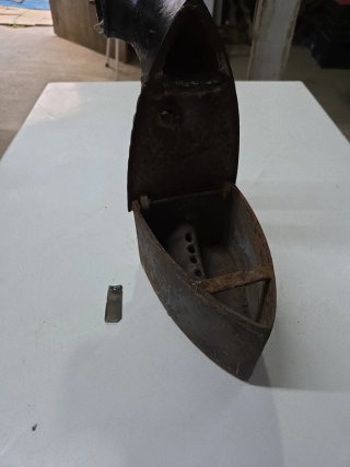 Plancha antigua de carbón