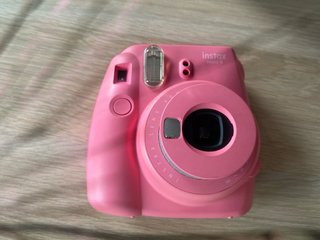 Cámara instantánea + funda + 18 fotos
