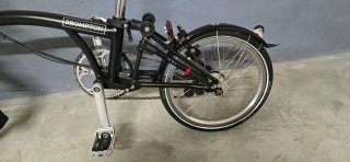 Bicicleta Brompton Negra Plegable + Bolsa Cesta