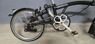Bicicleta Brompton Negra Plegable + Bolsa Cesta