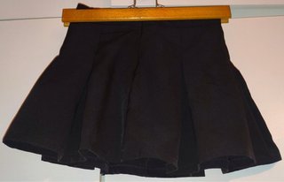 Vestido negro plisado