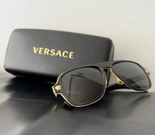 Occhiali da sole Versace neri e dorati