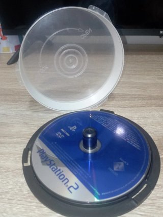 Consola PlayStation 2+ Cable AV + Lote 5 discos