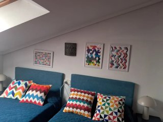 Cojines decorativos y cuadros
