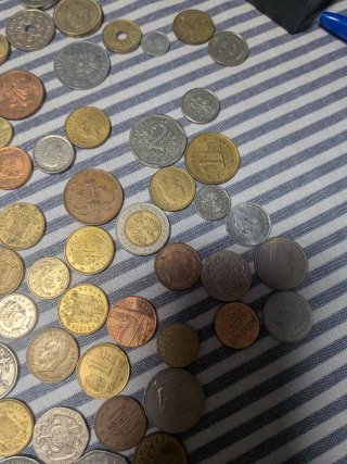 Oltre 150 Monete da Diversi Paesi