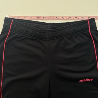 Pantalones clásicos Adidas negros con lineas rosas