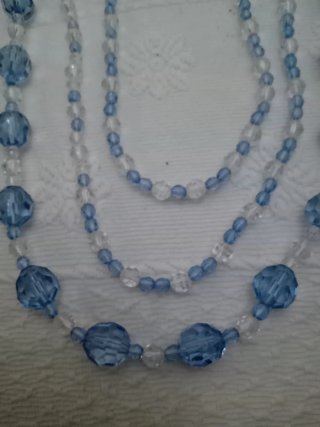 Cinturón/Collar de cuentas azul y blanco transpare