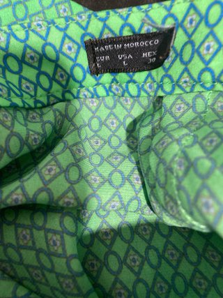 Pantalón verde pata ancha estampado