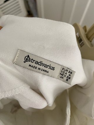 Pantalón de vestir blanco con cinturón
