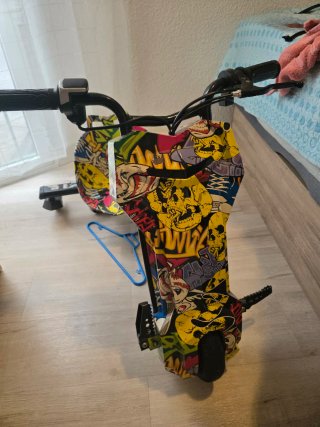 Triciclo eléctrico con cargador