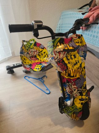 Triciclo eléctrico con cargador