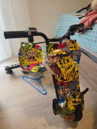 Triciclo eléctrico con cargador
