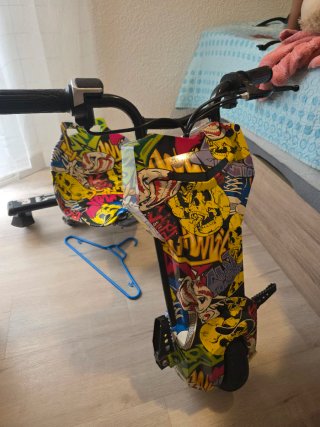 Triciclo eléctrico con cargador