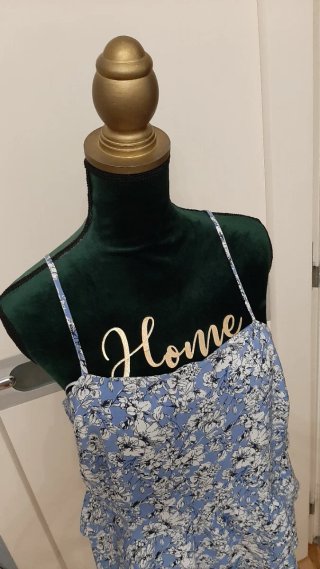 Top con peplo floreale