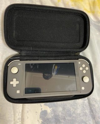 Nintendo Switch Lite Gris Urge venta! Negociable