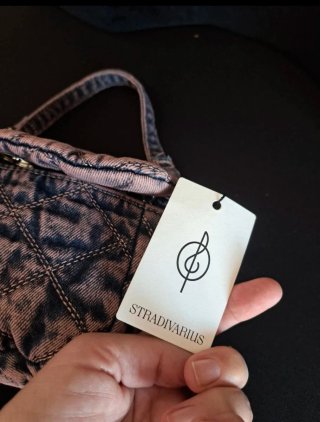 Bolso Stradivarius denim rosa y azul