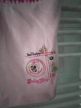 Vestitino rosa con fantasia a quadretti