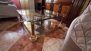 Dos Mesas a juego de centro cristal y metal dorado