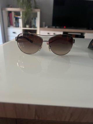 Gafas de sol Ray-Ban granate y plateadas