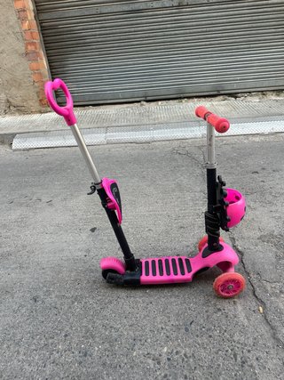 Patinete rosa con cesta