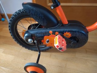 Bicicleta Btwin Naranja con Ruedines